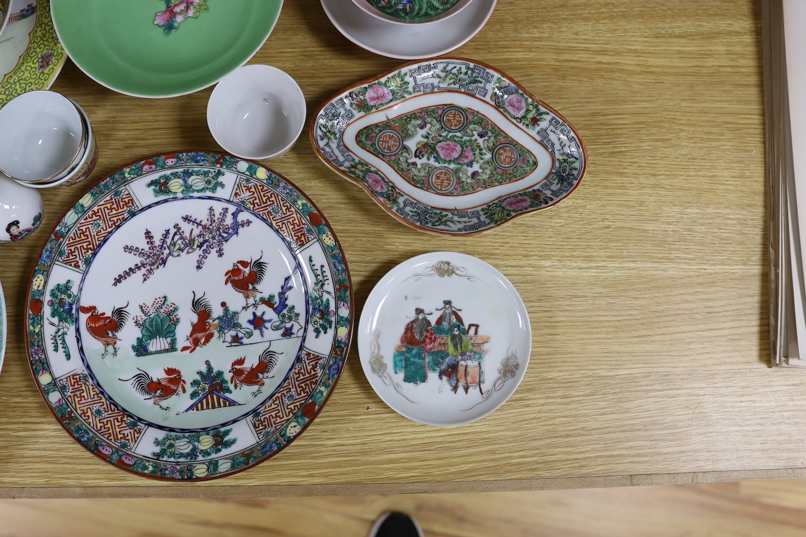 A group of Chinese enamelled porcelain plates, dishes, covers, cups and a vase